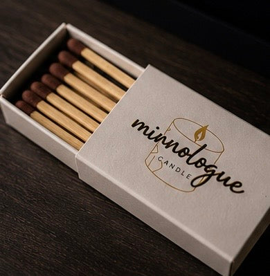 Premium Minnologue wooden matchbox with long safety matches, designed to complement luxury scented candles and create an elegant candle-lighting ritual.